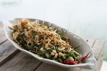 Thai spicy salad with three crispy varieties