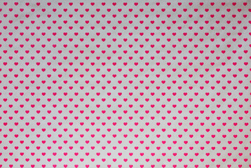 Gift wrapping paper with red hearts, background