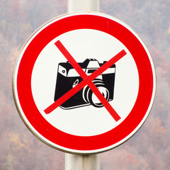 photography forbidden sign on a pillar