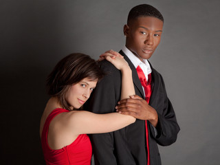 Interracial Couple in Suit and Dress