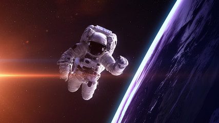 Astronaut in outer space. Elements of this image furnished by NASA