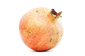 Pomegranate fruit closeup on white background