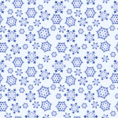 Blue seamless background with snowflakes, vector