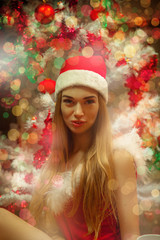 Funny christmas blonde girl in santa hat