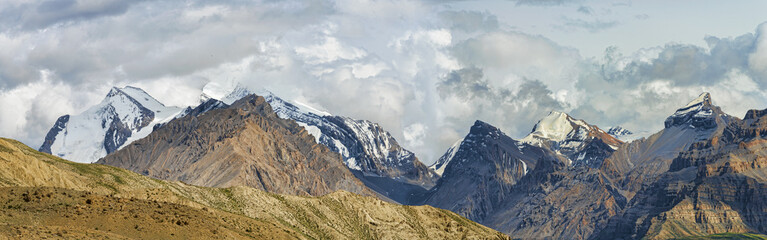Far snow peaks of Tibetan mountains panorama