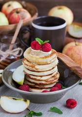 Breakfast with apple pancakes with honey