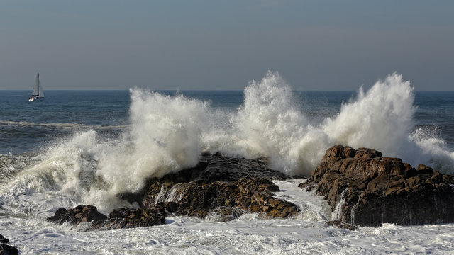 Splashing waves against rocks