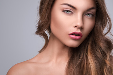 Fototapeta premium Beautiful woman with curly hair