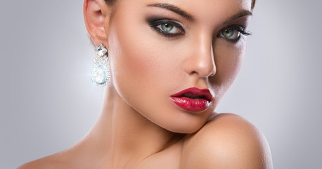 Gorgeous woman with luxury earrings © blackday