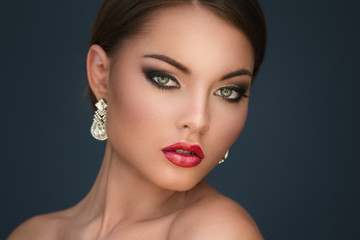 Fototapeta premium Gorgeous woman with luxury earrings