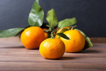 mandarins on wooden table