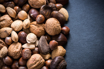 mixed dry nuts, food background