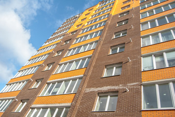 Fototapeta premium new multistory residential building in the background
