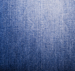 Texture of blue jeans textile close up