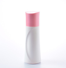 plastic bottle pink cap on white background