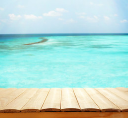 Wooden planks on sea background