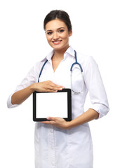 Smiling medical doctor holding a tablet isolated on white