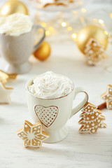 Beautiful composition with cups of cappuccino and Christmas cookies