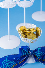 Hanukkah decoration with chocolate gelt coins.