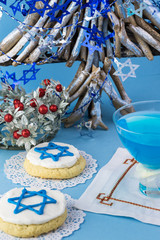Hanukkah cookies and blue cocktail.