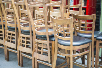 Stackable wood chairs in restaurant
