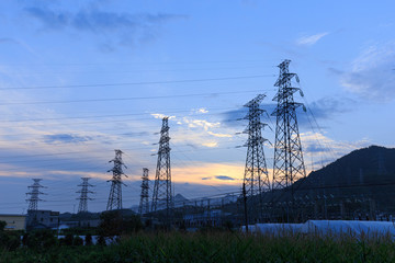 pylon on hill in blue sky