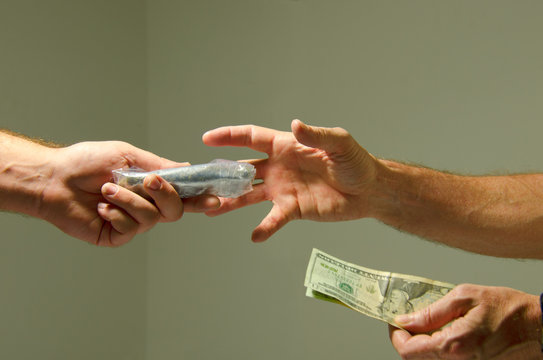 Exchange Of Money For Buying Drugs Illegal Drug Deal For Cash