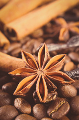 Vintage photo, Closeup of anise, cinnamon sticks and coffee grains, ingredients for cooking or baking