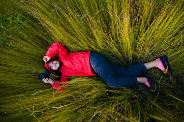 Girl lying on the grass