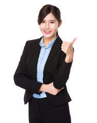 Businesswoman with thumb up gesture