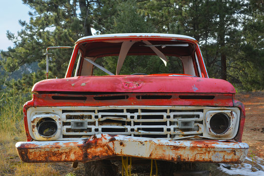 Rusting Red and White Pickup Truck