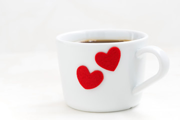 cup of coffee with red heart, closeup