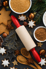 Fototapeta na wymiar cookies and ingredients for Christmas baking, vertical, top view