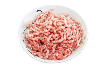 Bowl with ground meat on a light background