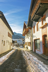 Sunlit narrow street in Garmisch-Partenkirchen