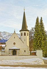 Fototapeta na wymiar Picturesque old church in Garmisch-Partenkirchen on a clear wint