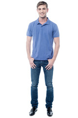 Obraz premium Full length portrait of young guy in casuals