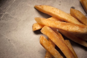 french fries on craft paper background
