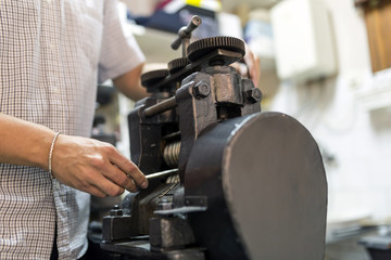 Goldsmith crafting metal