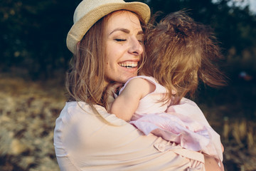 mother and daughter together outdoors