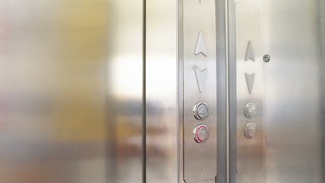 Clicking on the button in an elevator and lift movement