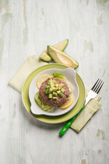 healthy hamburger with avocado and lettuce salad