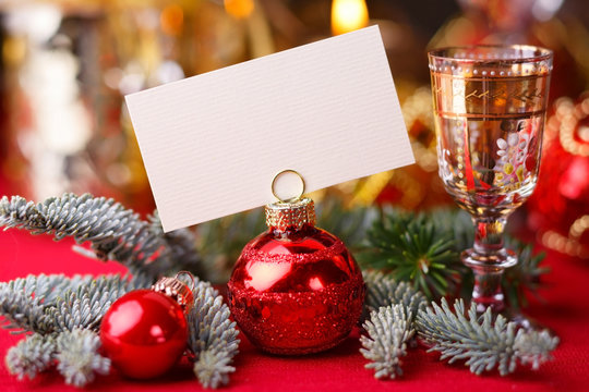 Christmas table setting with focus on blank place card  -  copy space for your text