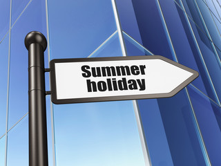Tourism concept: sign Summer Holiday on Building background