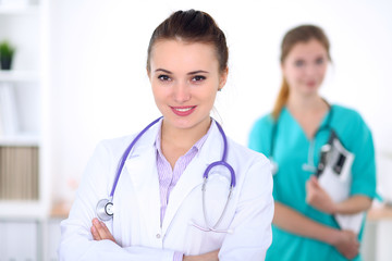 Portrait of young female  doctor in a hospital