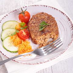 vegetarian patties, bulgur galette and salad