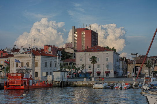Tourist harbor in Koper in Slovenia in a summer at sunset time.