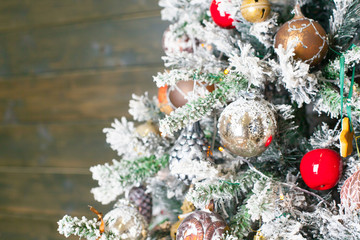 Fototapeta na wymiar Decorated Christmas tree in red and white colors