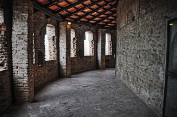 old hallway and brick wall seen from inside