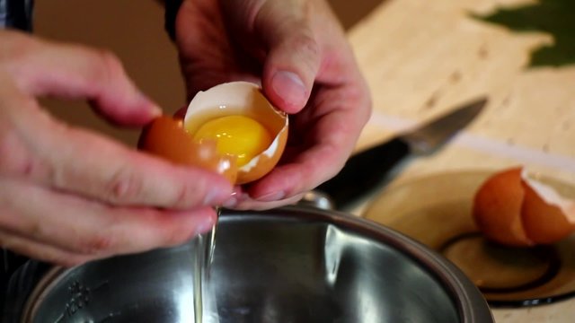 Separation of the white from the yolk